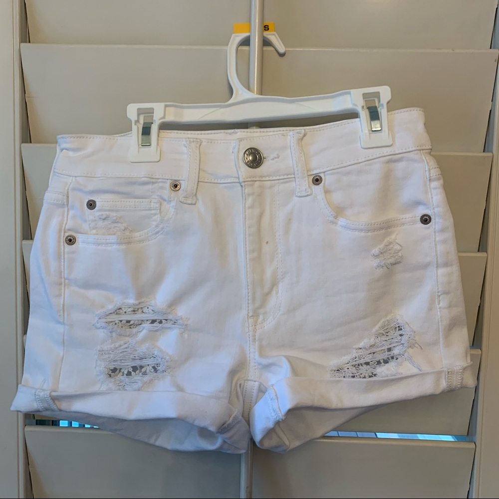 High waisted white ripped jean shorts